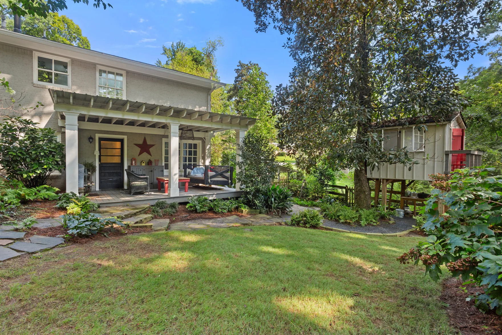Pool deck with lawn and plantings